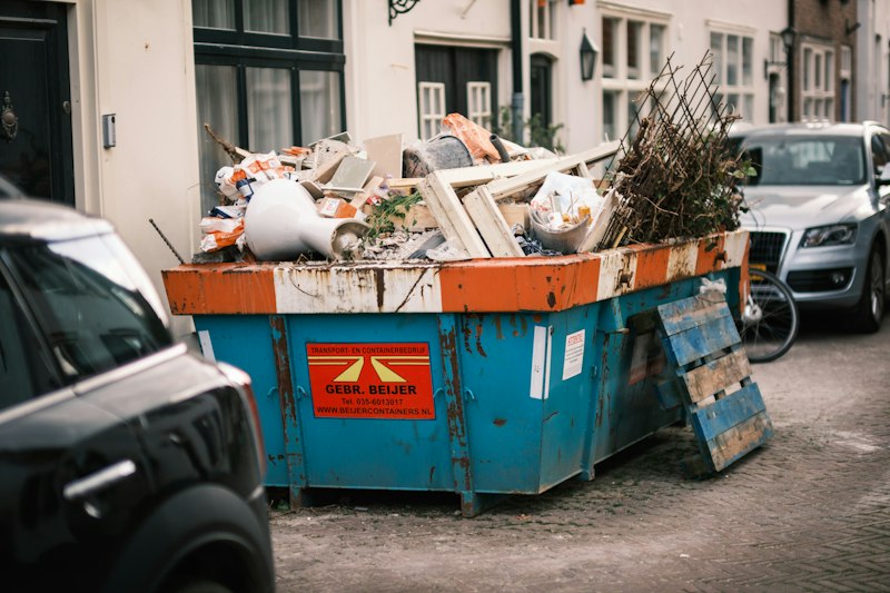 Household junk and renovation debris loaded for haul-away